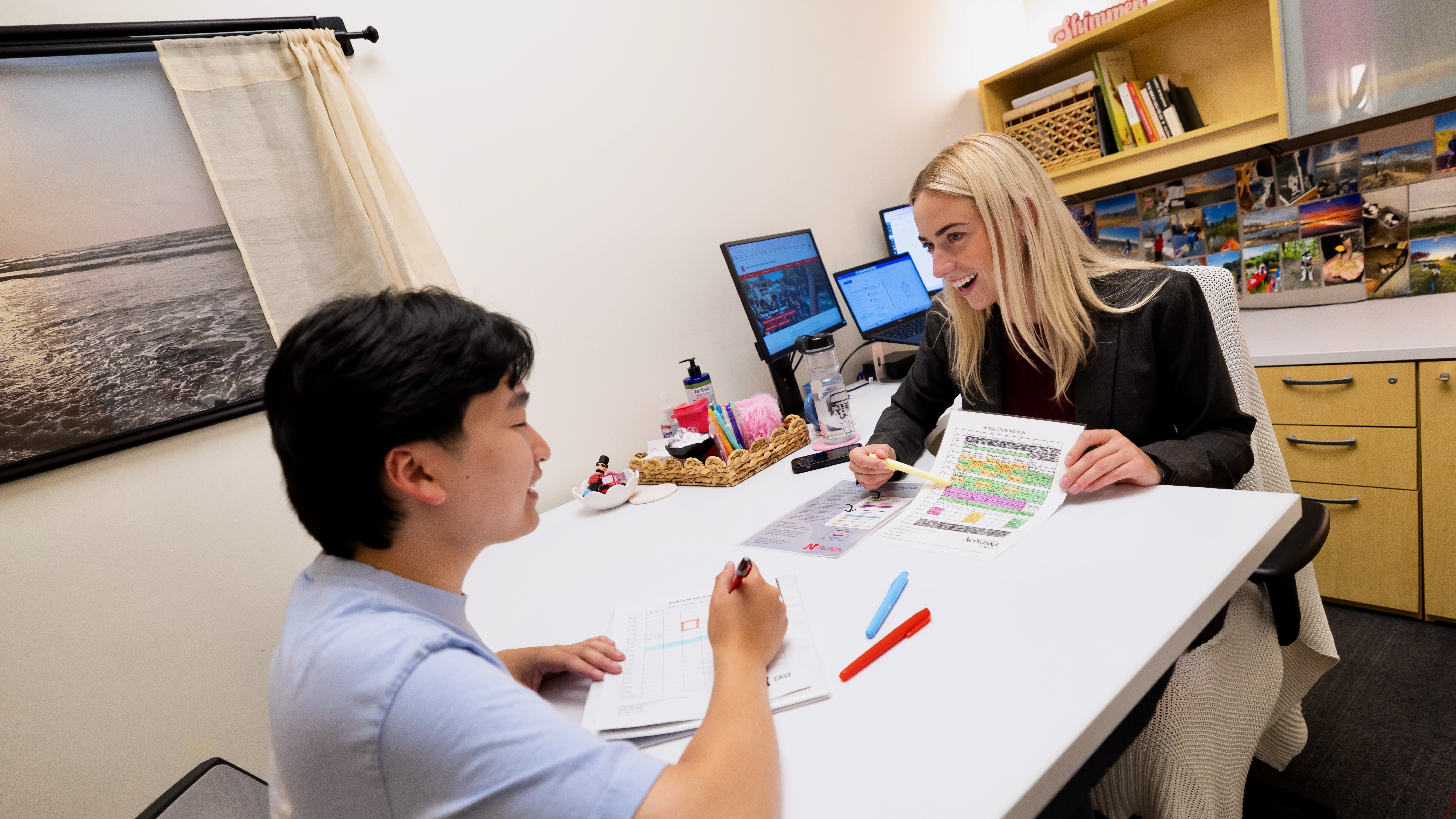 Abigail Zagotta, academic success coach in the Center for Academic Success and Transition, meets with Jimmy Truong, a junior studying supply chain management. Photo by Liz McCue / University Communication & Marketing.