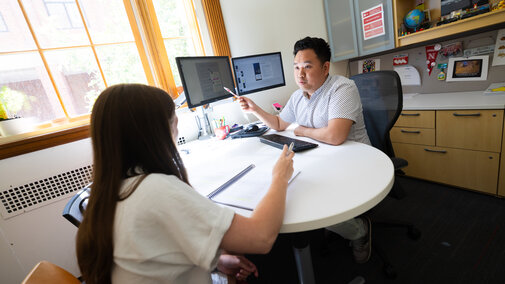 Donny Bui, academic success coach in the Center for Academic Success and Transition, meets with Kyanne Casperson, a senior studying sociology. Photo by Liz McCue / University Communication & Marketing.