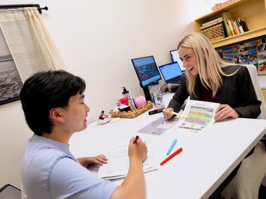 Abigail Zagotta, academic success coach in the Center for Academic Success and Transition, meets with Jimmy Truong, a junior studying supply chain management. Photo by Liz McCue / University Communication & Marketing.
