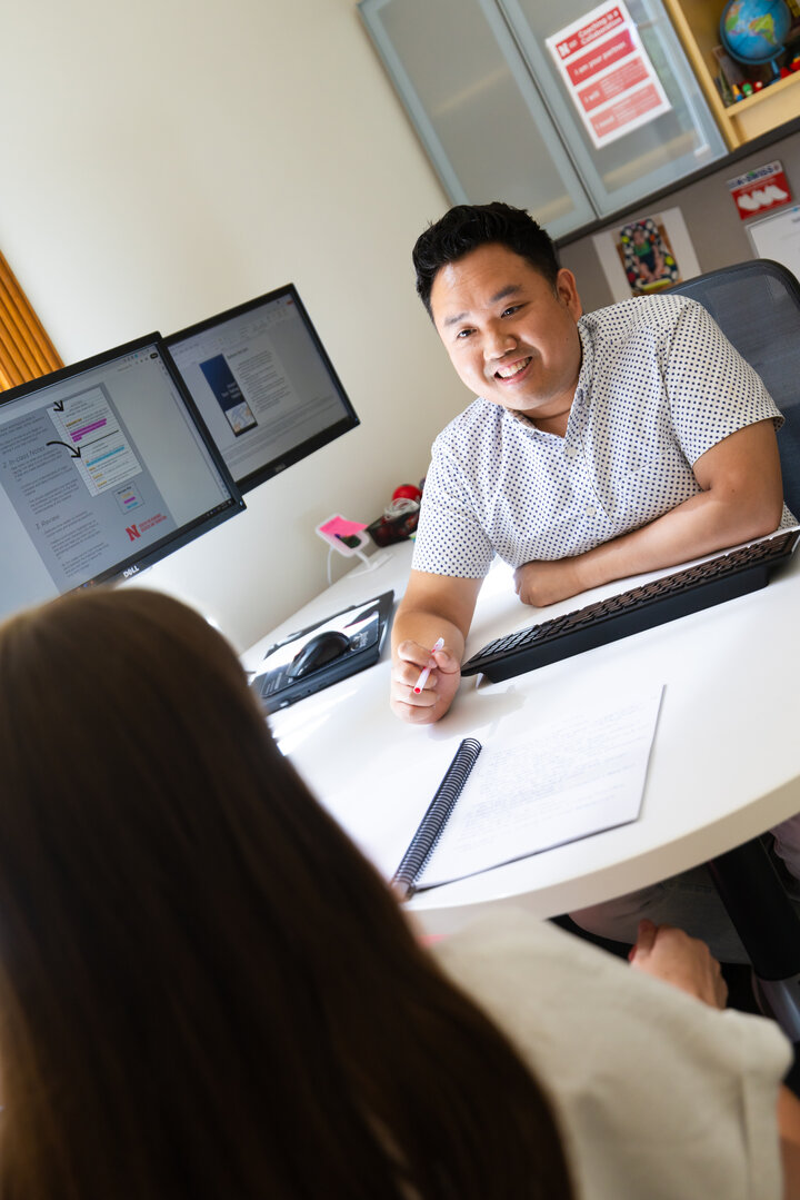 Donny Bui, an academic success coach in the Center for Academic Success and Transition, meets with Kyanne Casperson, a senior studying sociology. June 25, 2025. Photo by Liz McCue / University Communication and Marketing.
